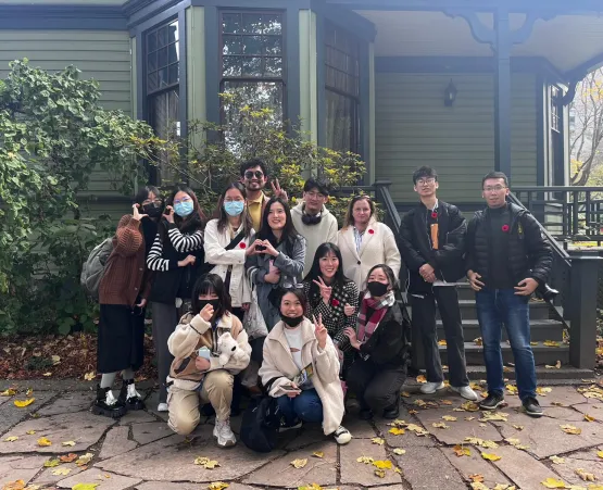 Pre MDM students standing in front of Roedde House